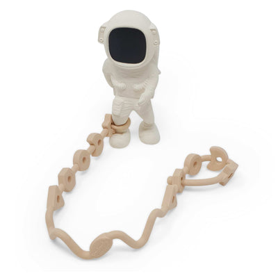 Squiggle Strap Silicone Toy Strap attached to AstroGNAW Astronaut shaped Space Toy by Thumble Baby Care